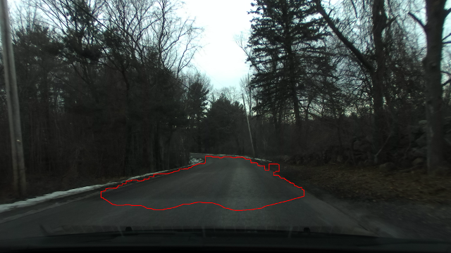 The same base image as above, however the erroneous areas to the left down the hill into the woods has been completely eliminated. The erroneous area to the light has been almost entirely eliminated except for a small area about 15 feet ahead of the vehicle and in a significantly flatter portion of the hill. Due to the small number of vertices in the erroneous area compared to the edge of the road surface, a regression line may largely eliminate that section.