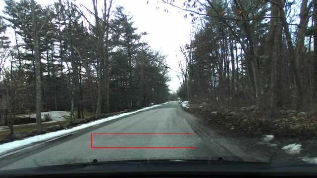 A small area roughly 2 to 3 meters in front of the vehicle and about 1 vehicle width wide highlighted in a red rectangle.